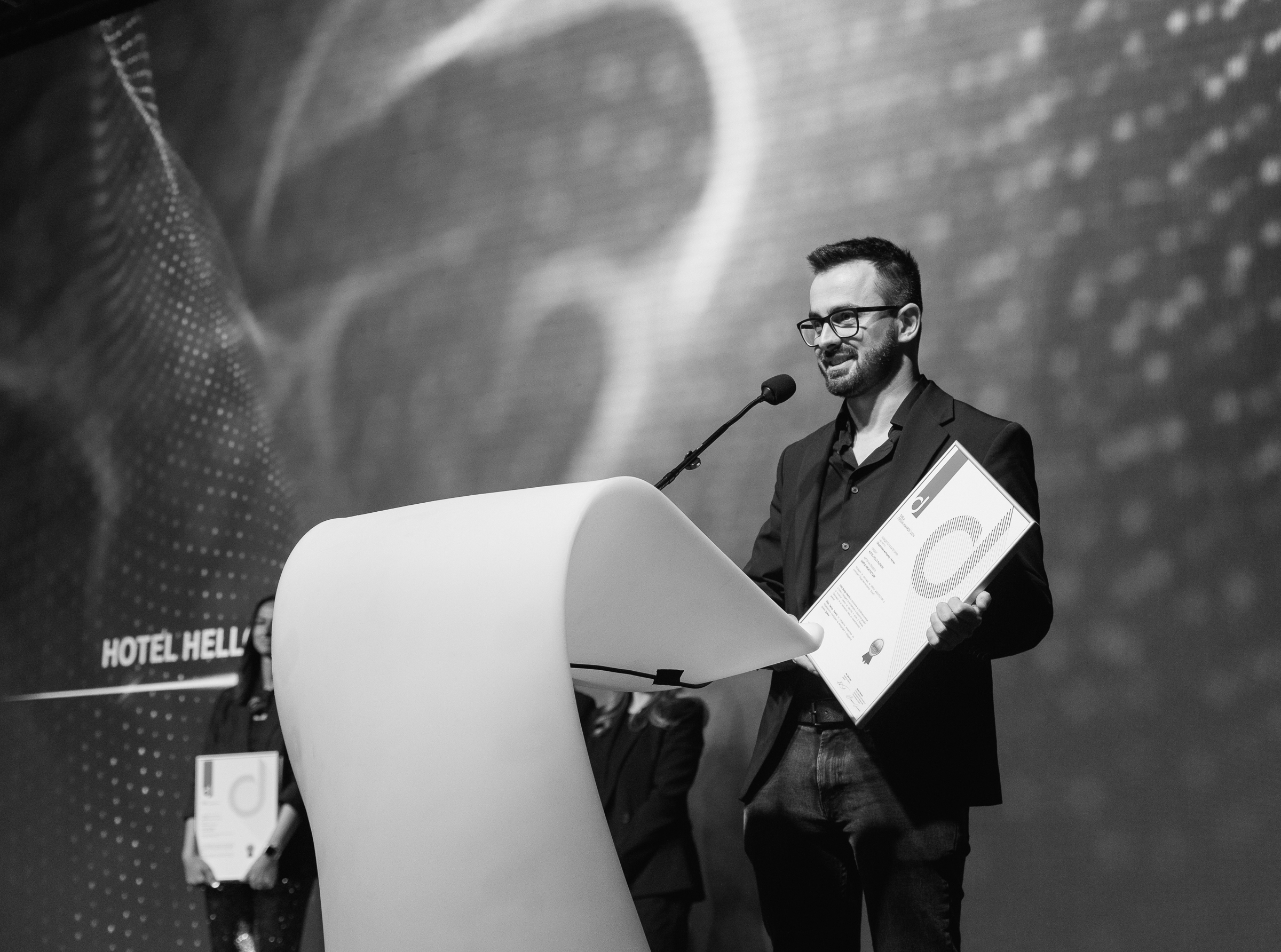 Alexander Yonchev receiving 2 awards at Dibla Design Awards 2024 for hotel and private house interior design