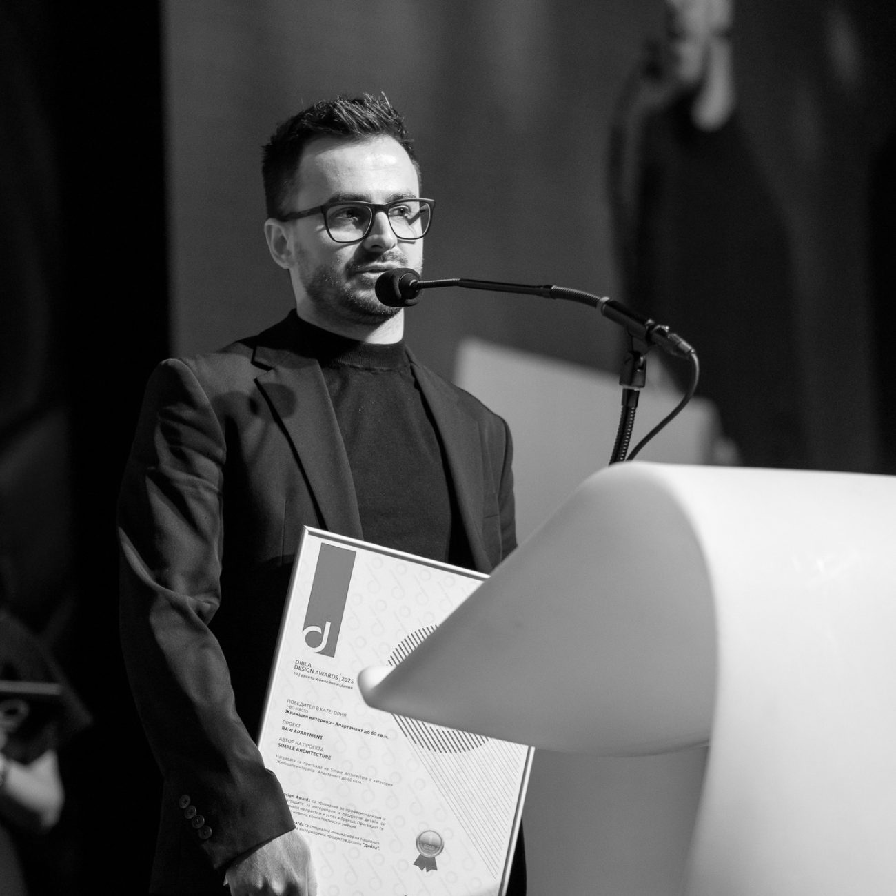 Alexander Yonchev from Simple Architecture holding 1st prize at Dibla Design Awards